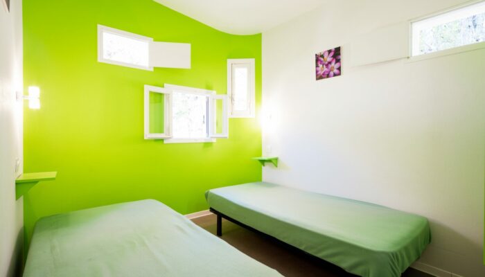 gite en dur chambre Villages vacances - LES BOIS DE PRAYSSAC - PRAYSSAC - Photo Herve Leclair aspheries